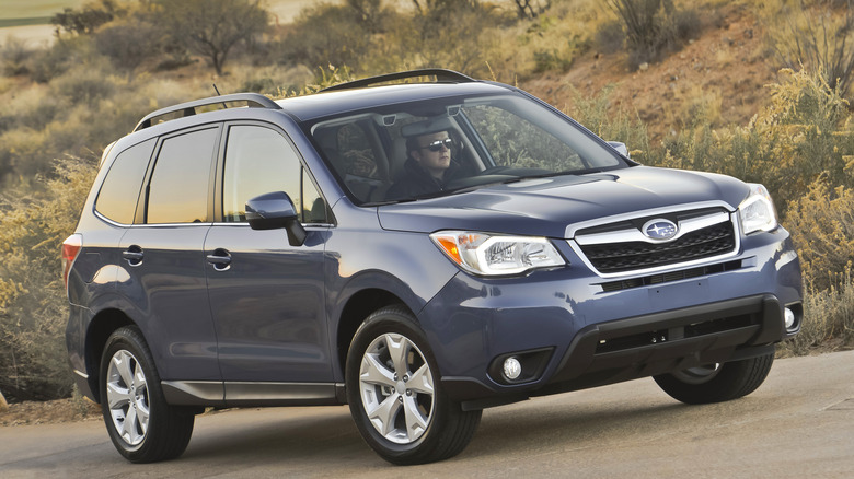 Blue 2014 Subaru Forester front quarter