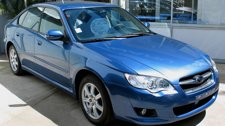 Blue 2009 Subaru Legacy parked