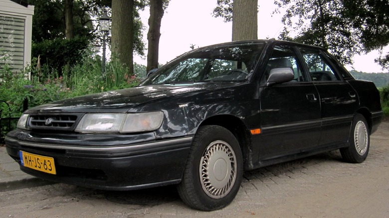 Black 1996 Subaru Legacy parked