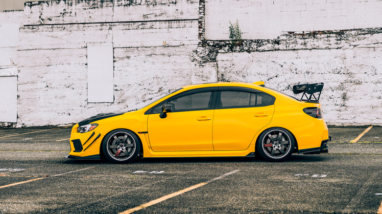 A yellow Subaru WRX