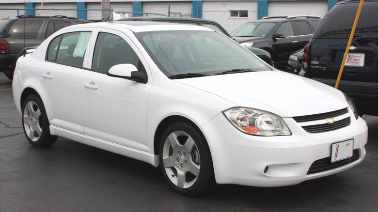 White Chevrolet Cobalt parked on tarmac