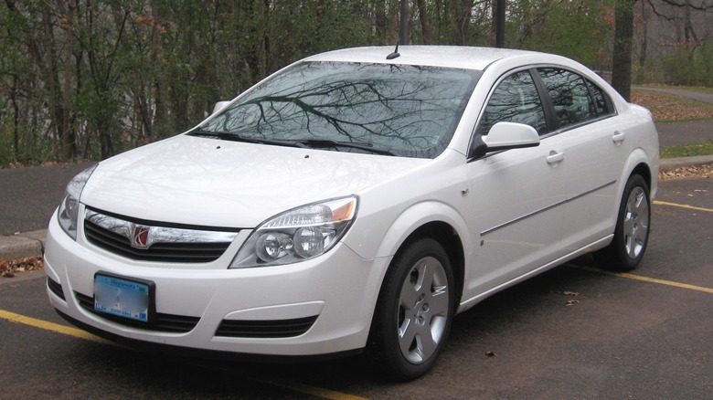 White 2007 Saturn Aura parked on tarmac