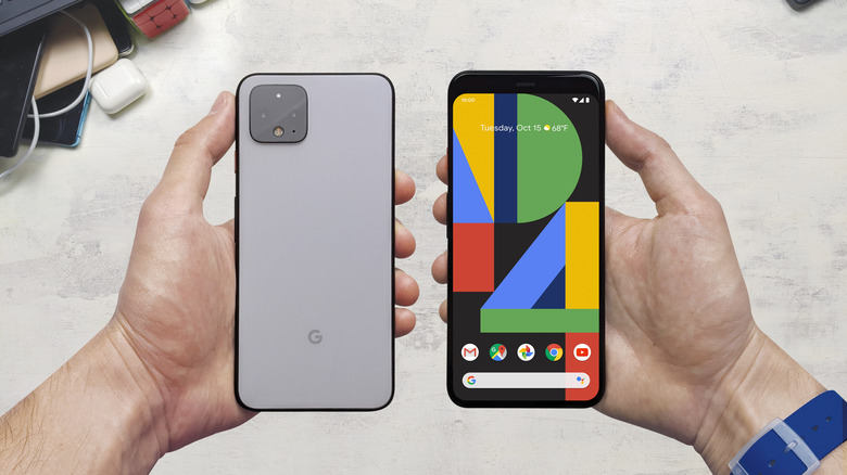 man holding a google pixel 4 smartphone