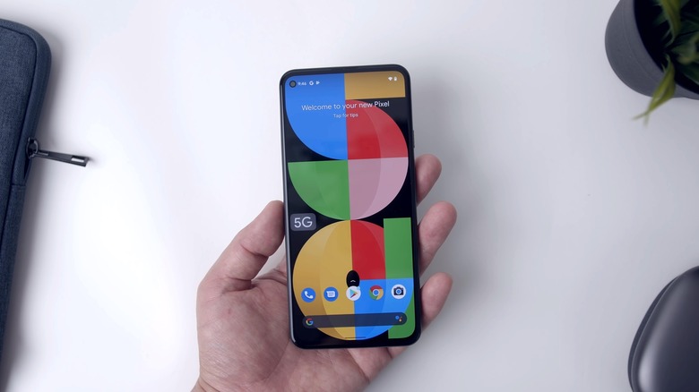 Google Pixel 5a smartphone in a man's hand