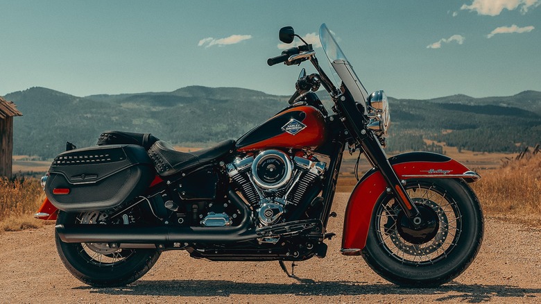 Red 2025 Harley-Davidson Heritage Classic parked on dirt