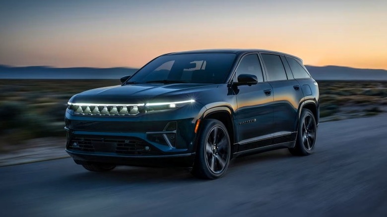 Jeep Wagoneer S EV driving on road during sunset