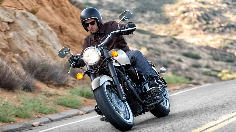 Person riding a Vulcan 900 Classic on a road