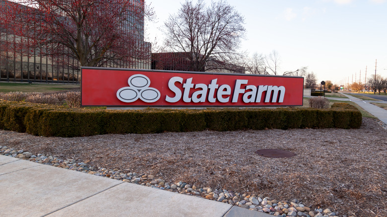 A State Farm sign out of on a fall day