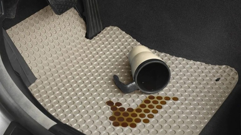 Lloyds floor mat with spilled coffee