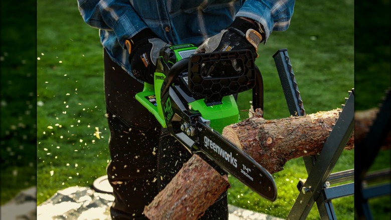 cutting with a Greenworks chainsaw