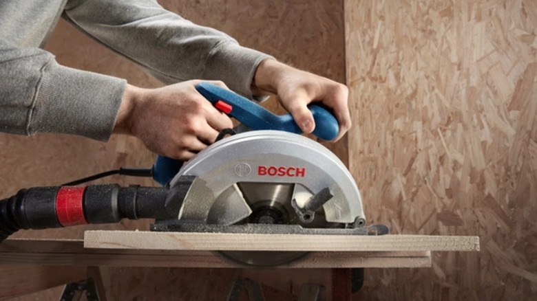 Man using Bosch circular saw