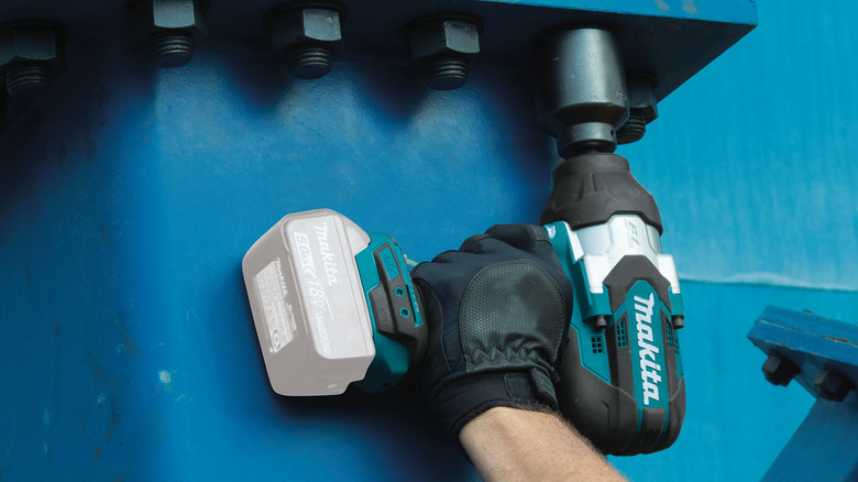 Makita impact wrench being used on large fasteners