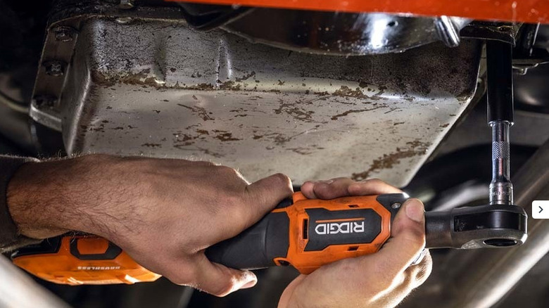 Removing transmission pan with Ridgid ratchet wrench