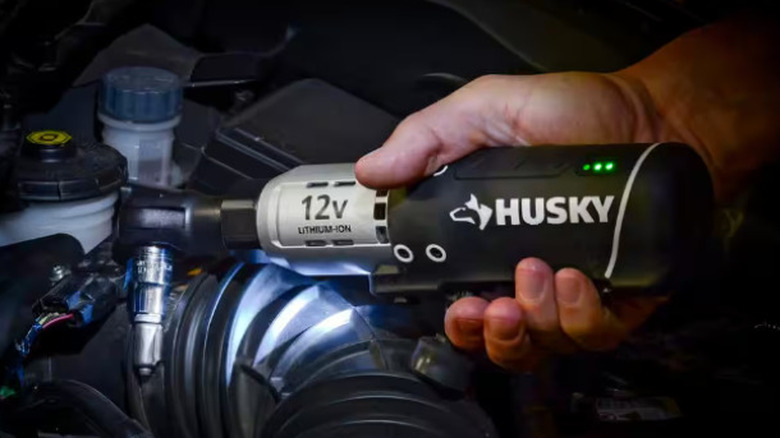 Removing hose clamp with Husky ratchet wrench