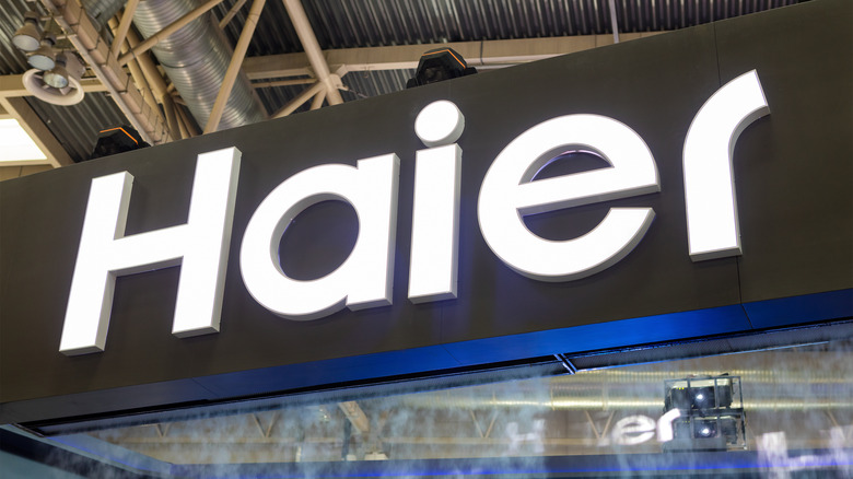 a Haier sign above store