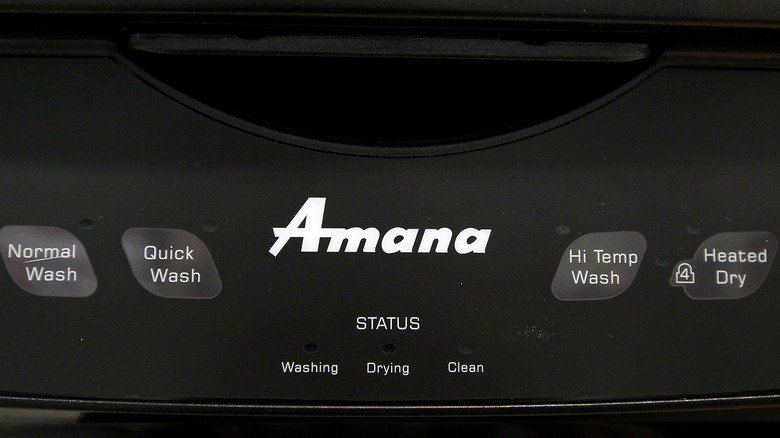 Amana logo is displayed on a dishwasher with settings