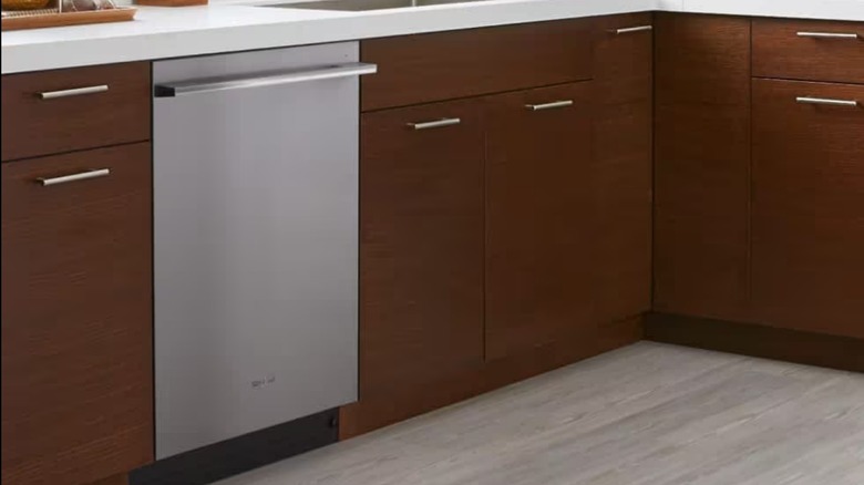 white Whirlpool dishwasher in typical kitchen