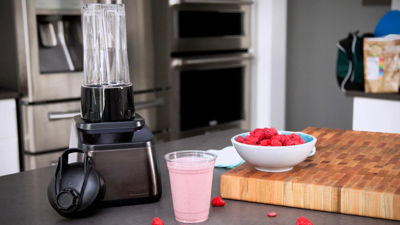 Blendtec blender next to a smoothie