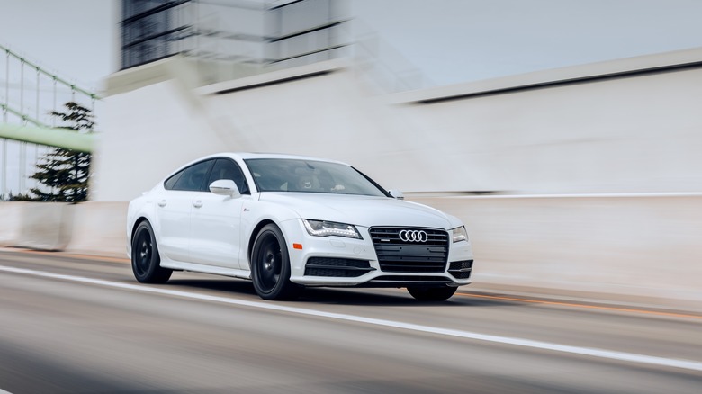 White Audi A7 sedan in motion