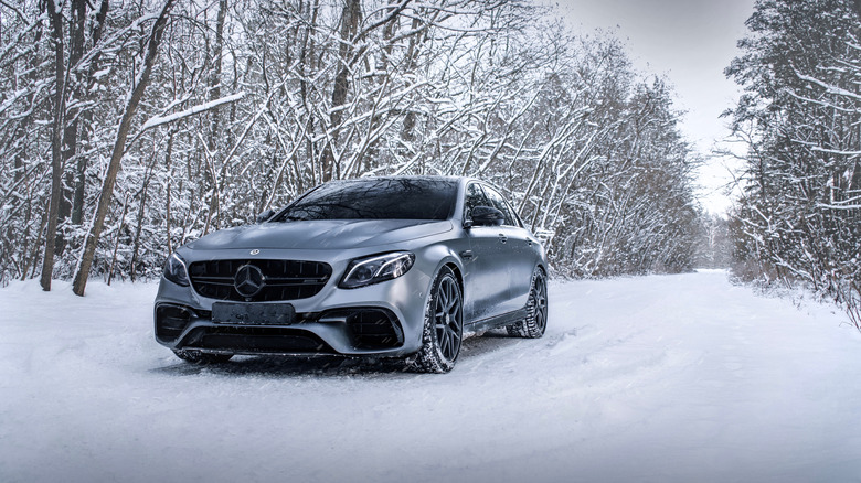 Silver Mercedes-Benz S-Class driving on snow