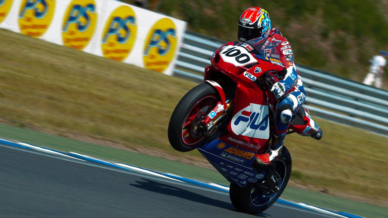 A Ducati 999 popping a wheelie