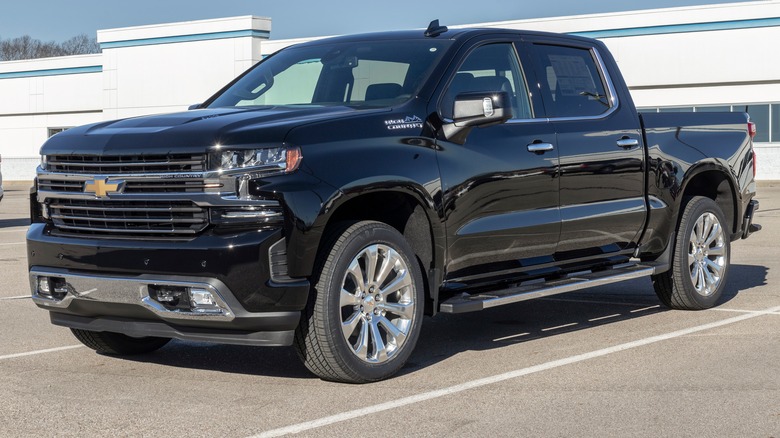 Chevy Silverado parked in a dealership parking lot