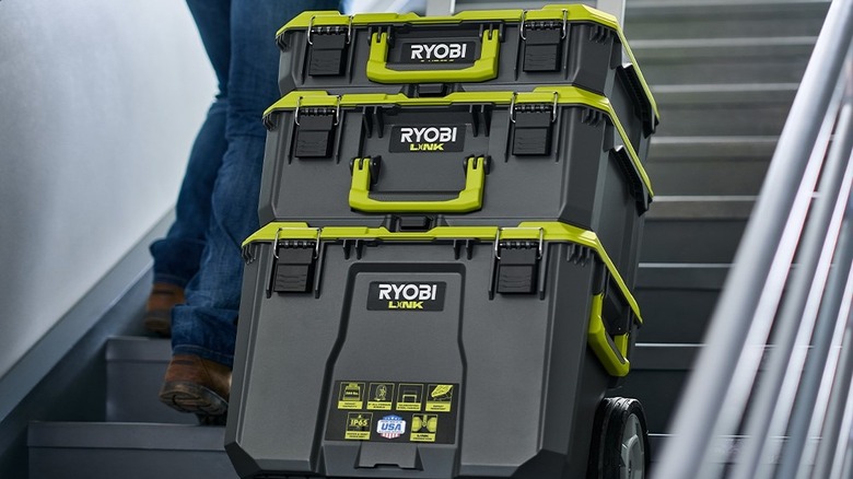 Ryobi toolboxes getting pulled up stairs