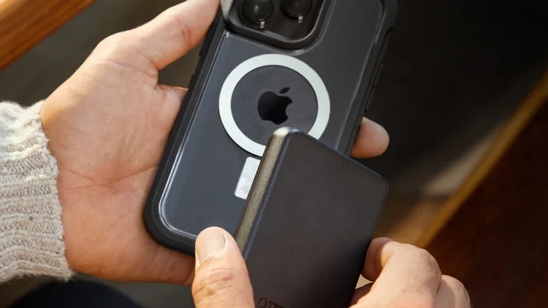 Person holding OtterBox power bank