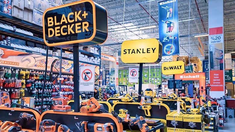 Black & Decker, Stanley, and DeWalt tools together