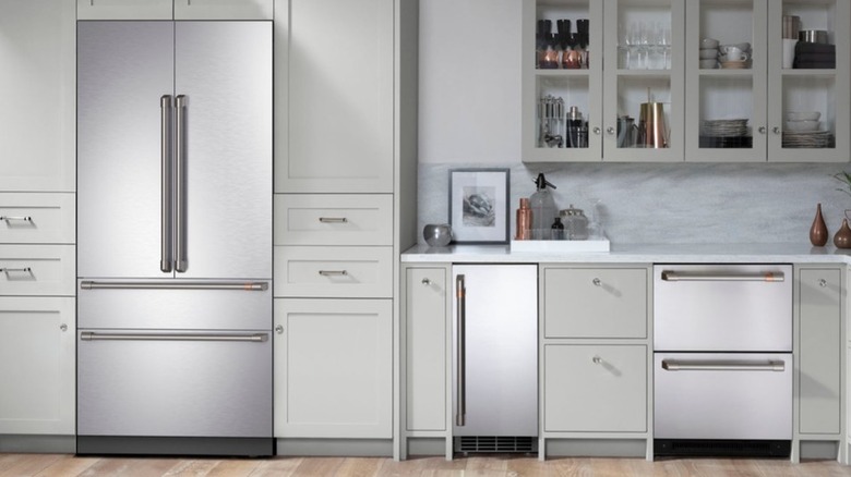 Silver appliances in a white kitchen