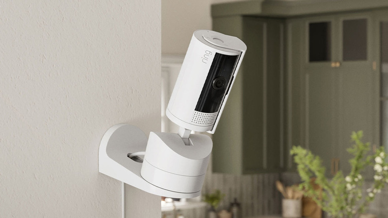 The Ring Pan-Tilt indoor camera mounted on a wall.