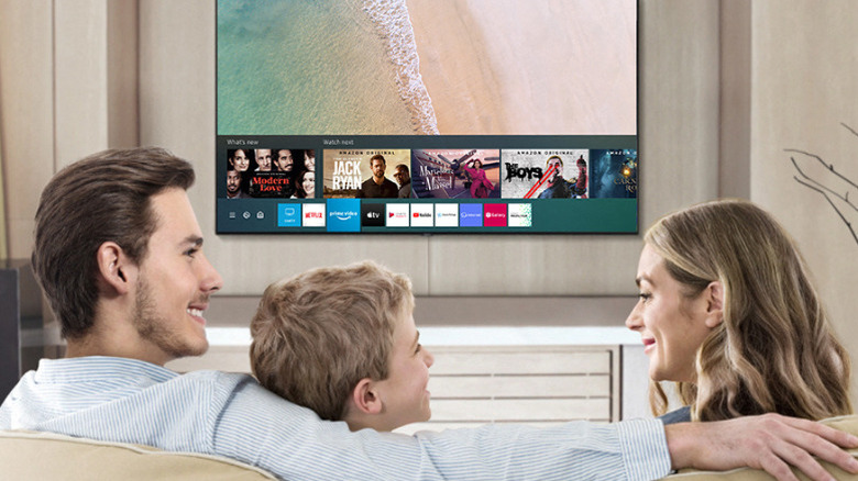 Family using Samsung Tizen smart TV OS