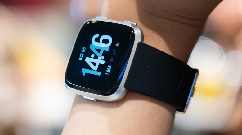 Fitbit Versa 4 displaying steps and heart data