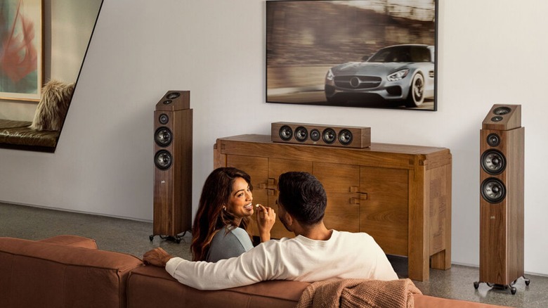 Polk home theater with couple