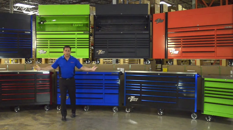 Salesperson in front of several Extreme Tools boxes