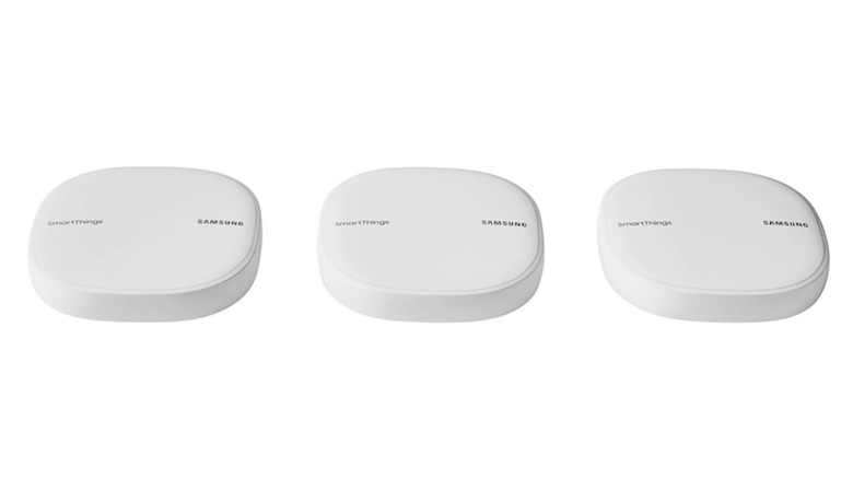 Three Samsung SmartThings routers on display