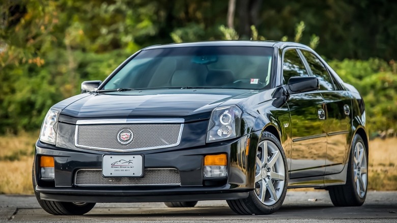 Black Cadillac CTS-V parked on tarmac