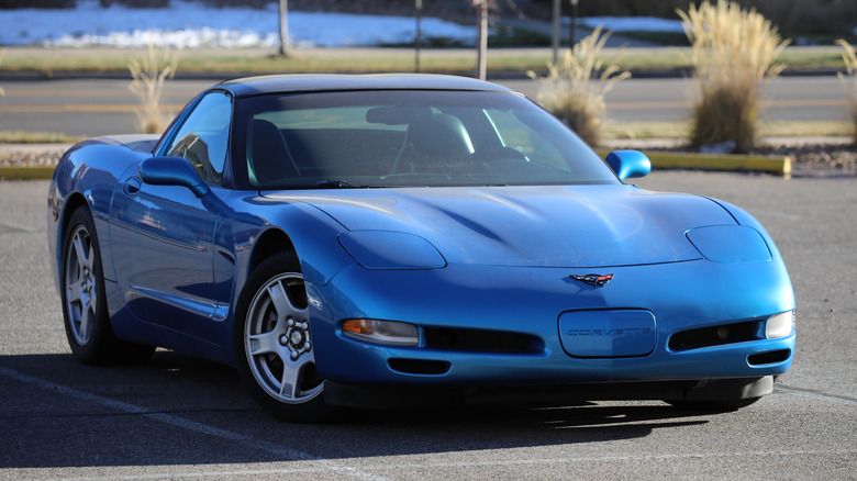 Blue Chevrolet Corvette C5 parked on asphalt