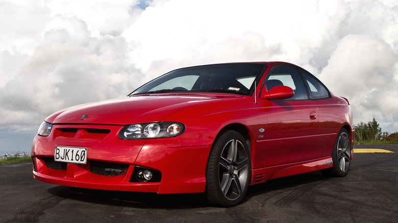 Red 2003 HSV GTO parked on asphalt