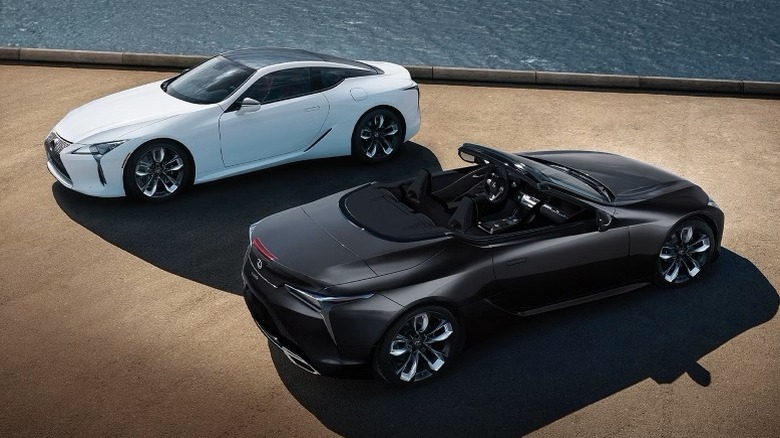 2025 Lexus LC 500 coupe and convertible parked next to water