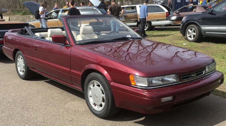 Maroon Infiniti M30 convertible parked