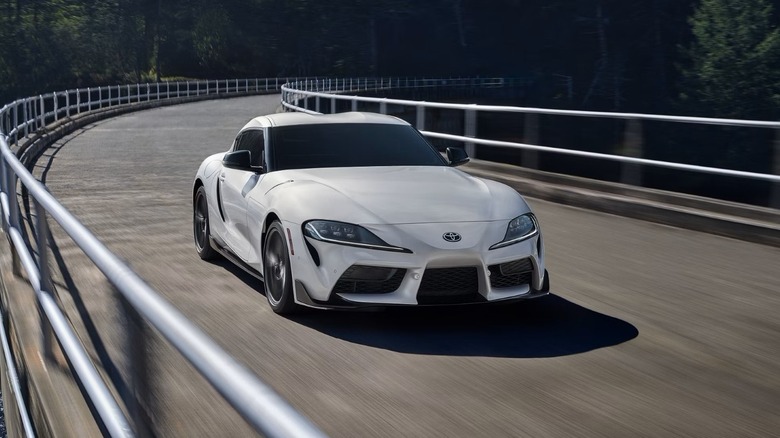 Front-right 3/4 action shot of a 2025 Toyota GR Supra