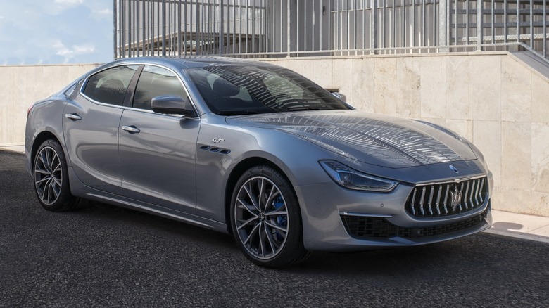 Maserati Ghibli parked by building