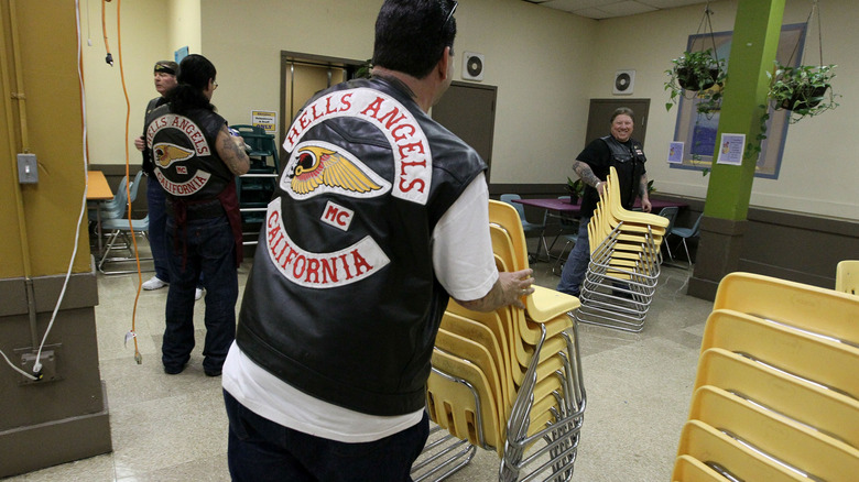 Hells Angels members setting up a charity dinner event