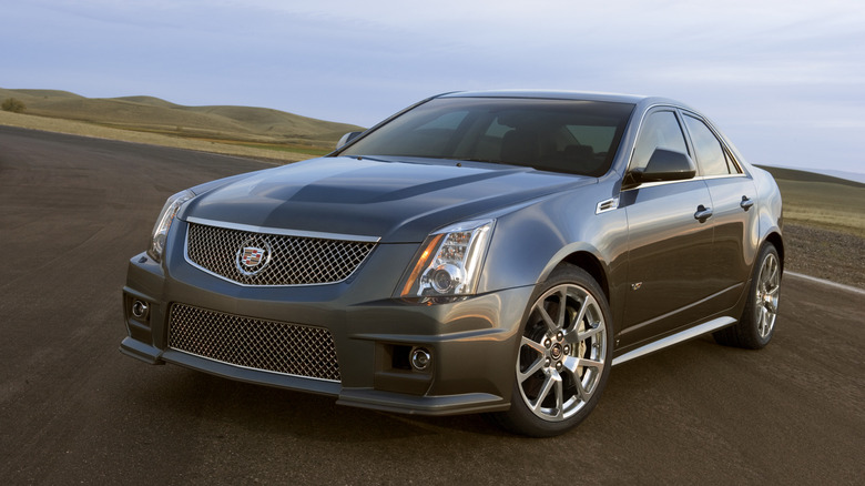 Second-gen Cadillac CTS-V parked on an empty track front 3/4 view