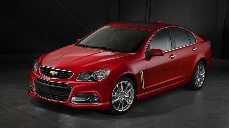 Red 2014 Chevrolet SS studio shot front 3/4 view