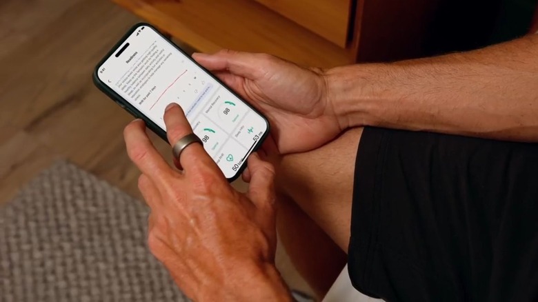 Amazfit Helio being worn while user browses associated app