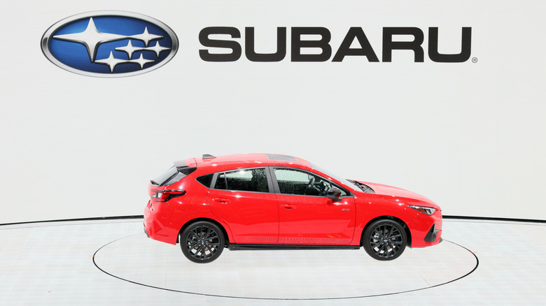 Red Subaru Impreza on display