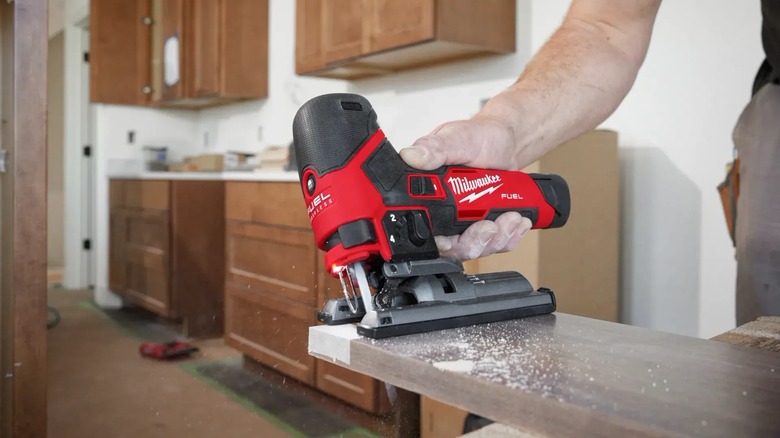 cutting a board with jigsaw