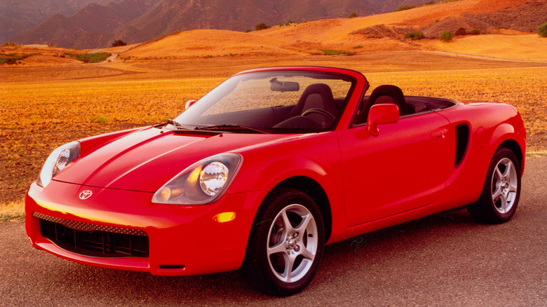 A red 2000 MR2 Spyder in the desert.